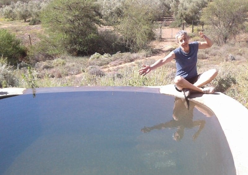 Ang sitting next to the pool at Numbi Valley