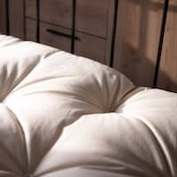 Furniture-Free Living: Why We Love It (What We’ve Learnt So Far) 2 Close-up shot of Japanese futon against a bamboo wall